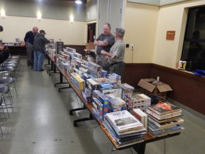 Club officers prepare for the auction