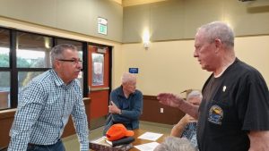 The Contest Committee discussing items for the upcoming Model Expo