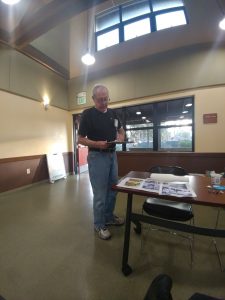 Treasurer Gary Williams gives his report to the club