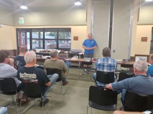 Bob Ekstrom leads the meeting