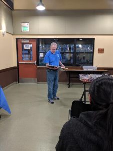 Gary Williams gives the Treasurer's report for March