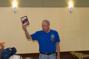 Gary Williams shows the Model Expo award design to the club