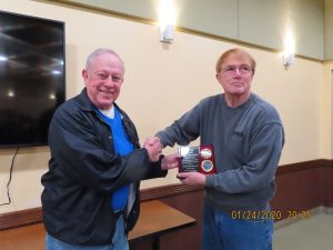 The club presented Gary with a plaque