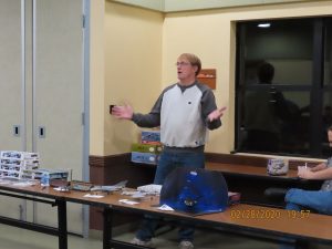 Club President Richard Abraham brings the meeting to order